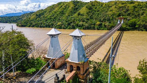Aerial view of the historic Puente de Occidente in Santa Fe de Antioquia, Colombia photo