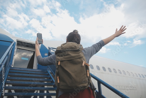 Happy attractive asian woman traveler with backpack at the modern airport terminal, copy space, Tourist journey trip concept