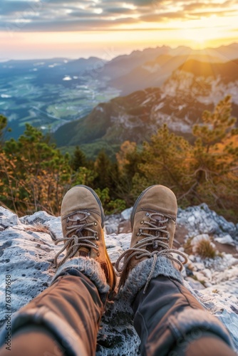 close-up of hiking boots overlooking a mountain landscape © Salander Studio