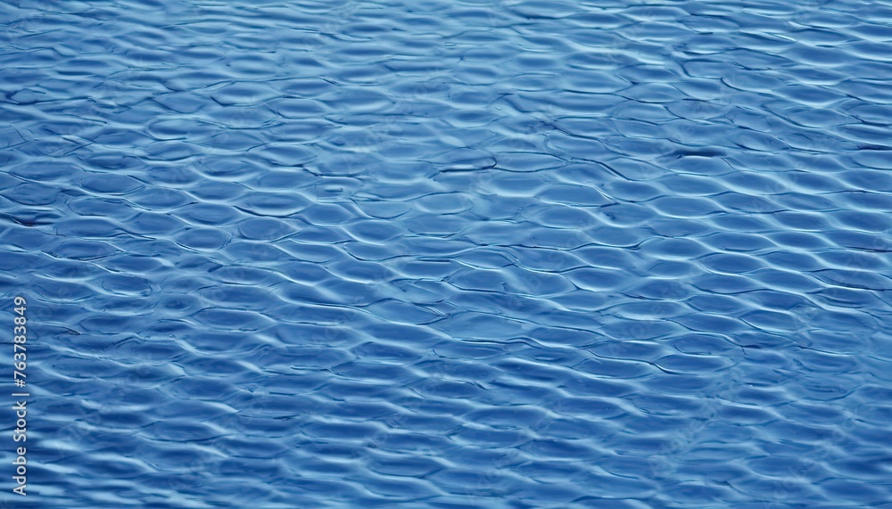 Obraz premium Water ripple texture background, blue tiles