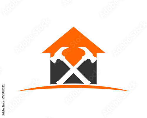 Hammer crossed inside the house logo