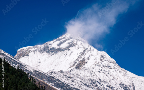 Landscape view of snow covered mountains in Nepal. photo