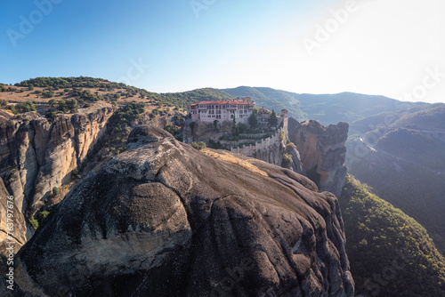 High aerial drone view of Monastery of Varlaam in Meteora  Greece. Iera Moni Barlaam  a UNESCO World Heritage site.
