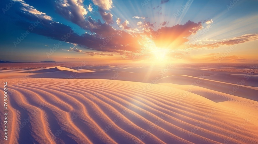 A majestic sunset casts golden hues over the rolling dunes of a tranquil desert, creating a landscape of serene beauty.