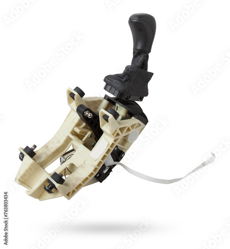 Spare part on a white isolated background in a photo studio for sale at an auto-parsing or replacement in a car service center - Automatic transmission selector gear lever with plastic elements