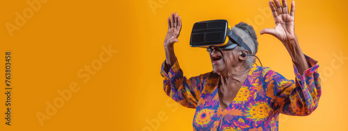 A woman in a bright shirt and virtual reality glasses photo
