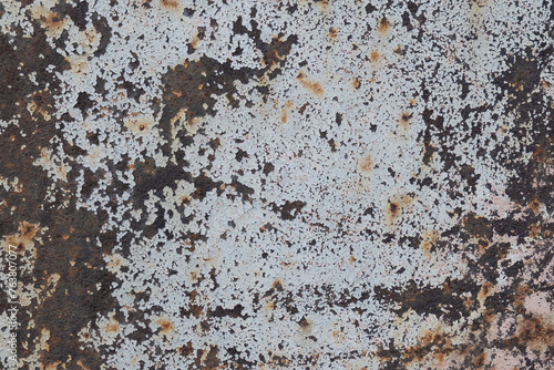 Rusty metal brown close up texture. Grunge wall background. © akini
