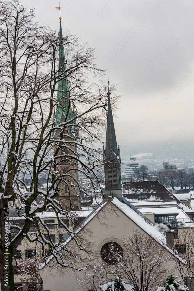 Snow covered church tower in Zurich, Switzerland