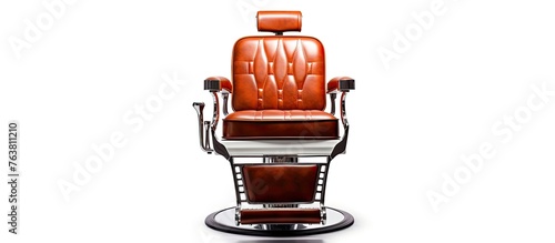 A detailed view focusing on a barber chair's close-up appearance, highlighting its seat made of luxurious brown leather material photo