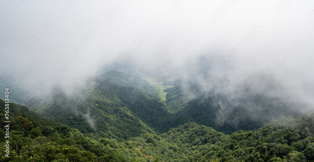 fog coverd the valley, sight from the mountain peak, in Keelung City, Taiwan.
