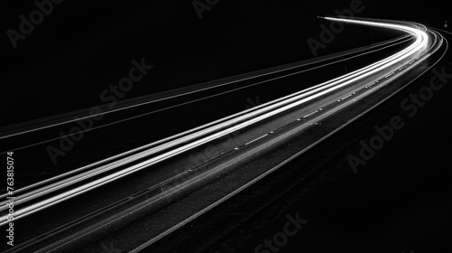 white lines of car lights on black background