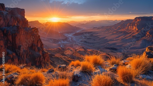 Sunrise over a vast mountain range, illuminating the valleys and highlighting the intricate topography and terrains