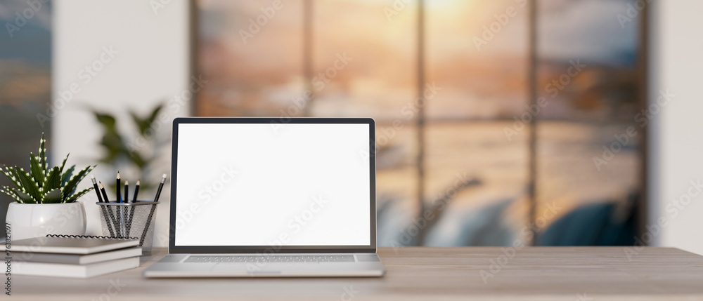 A close-up image of a laptop computer mockup and stationery on a wooden desk in a modern office. - obrazy, fototapety, plakaty 