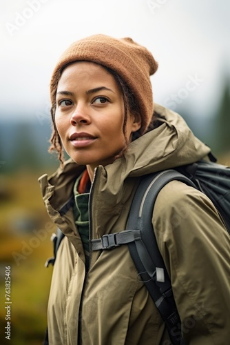 shot of a young woman out for a day hike © Sergey