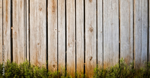 Aged white barn wall with a rustic wooden surface and aged panels.