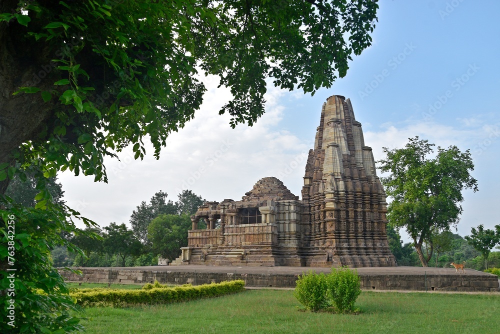  Beautiful temple adorned with sculptures and surrounded by peaceful nature., Duladeo Shiva Temple - Khajuraho - Madhya Pradesh - India


