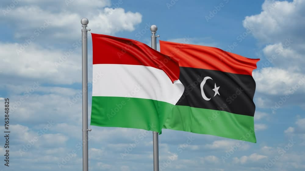 Libya and Hungary two flags waving together, looped video, two country cooperation concept Libya and Hungary two flags waving together, looped video, two country cooperation concept