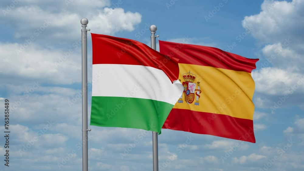 Spain and Hungary two flags waving together, looped video, two country cooperation concept Spain and Hungary two flags waving together, looped video, two country cooperation concept