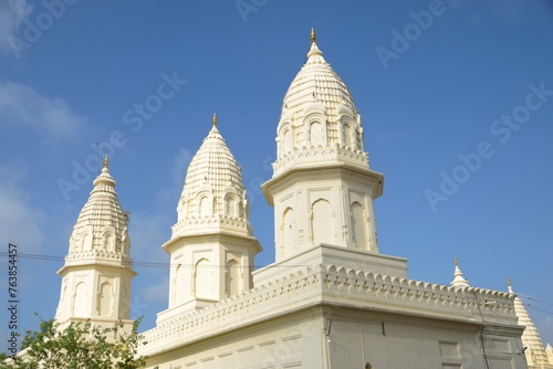  A serene Jain temple with intricate carvings and statues, radiating peace and spirituality. at Shantinath Jain temple Khajuraho, Madhya Pradesh, India photo