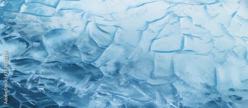 Close up of frozen blue surface with water