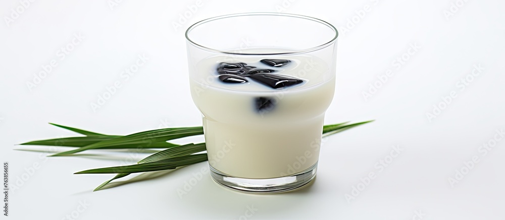 Glass of milk with ice cubes Glass of milk with ice cubes