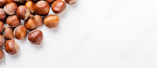 A close up of assorted nuts on a white background photo