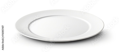 A white plate on a white surface