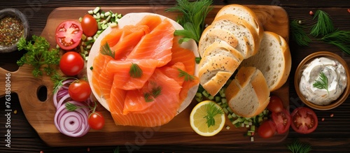 Wooden cutting board with sliced salmon and vegetables
