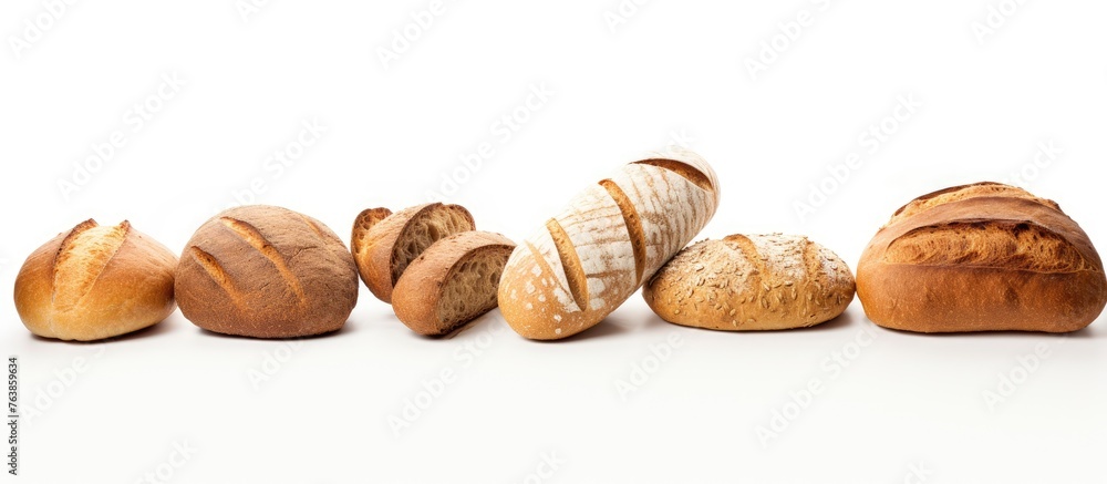 A row of loaves on a white surface
