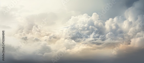 In the sky  there is a large cloud covering the view as a plane passes through it