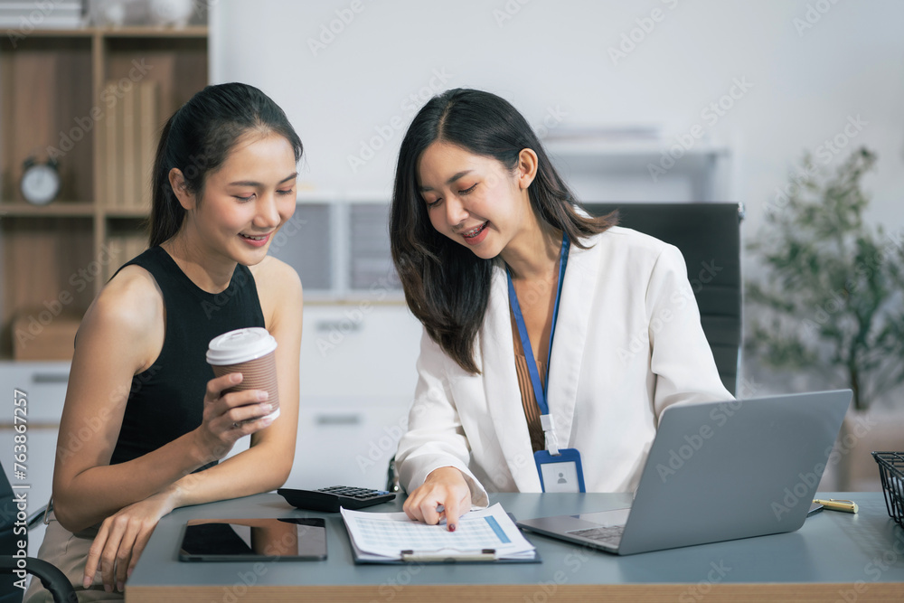 Business, technology and office concept - two businessmen with laptop, tablet pc computer and papers having discussion in modern office. Business, technology and office concept - two businessmen with laptop, tablet pc computer and papers having discussion in modern office.