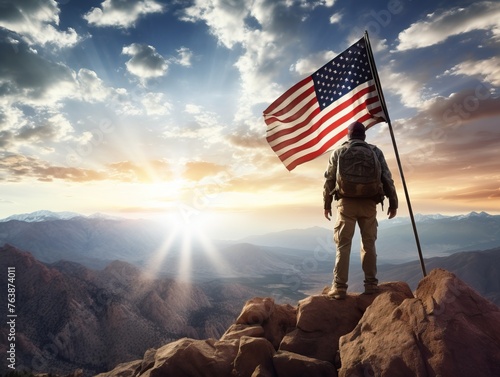 Proud man holding american flag atop a majestic mountain peak