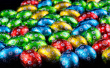 Small Easter Eggs against a black background