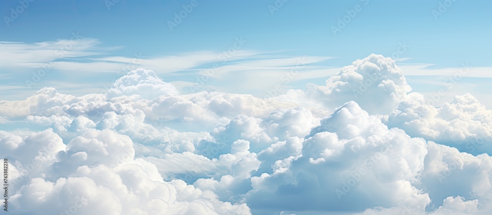 An image capturing the expansive view of the sky and distant horizon from an airplane window