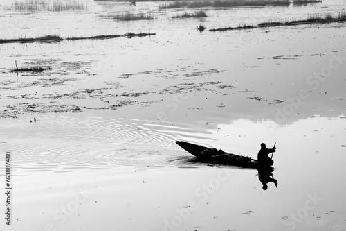 Kashmiri paddling boat, Nagin Lake, Dal Lake, Srinagar, Kashmir, Jammu and Kashmir, India, Asia photo