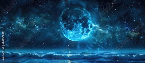 The electric blue moonlight illuminates the calm body of water below, creating a captivating scene in the night sky. This astronomical event is a beautiful display of natures beauty