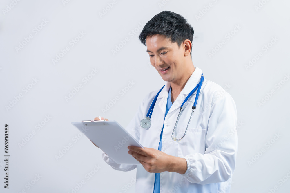 Attractive Middle aged asian male doctor pediatric, physical or psychiatrist in white coat with stethoscope standing isolated on white background, virus, health care, disease treatment Attractive Middle aged asian male doctor pediatric, physical or psychiatrist in white coat with stethoscope standing isolated on white background, virus, health care, disease treatment