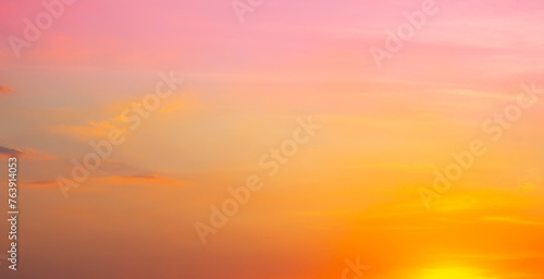 Enjoy a panoramic view of the skyline. The sun rises in the morning sky with colorful clouds. and beautiful cloud patterns In the soft light of the morning