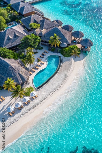 Fototapeta Naklejka Na Ścianę i Meble -  Tranquil aerial view of maldives island beach  luxury resort amid palm trees on white sandy shore