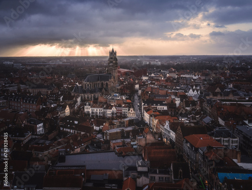 The skyline of Bruges in a rainy day
