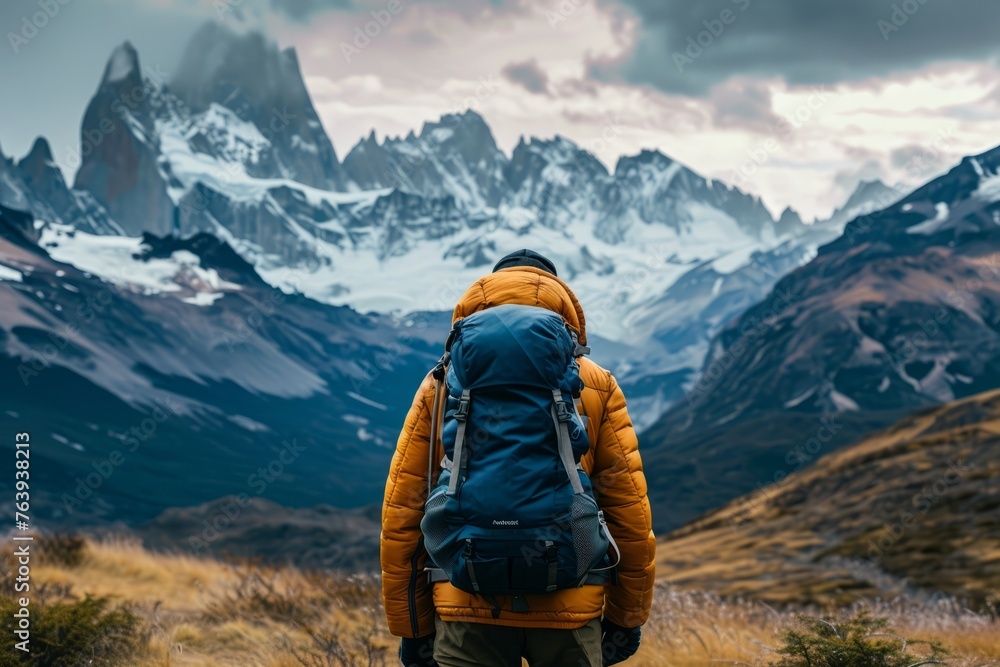 Unrecognizable person traveler, standing near the mountain