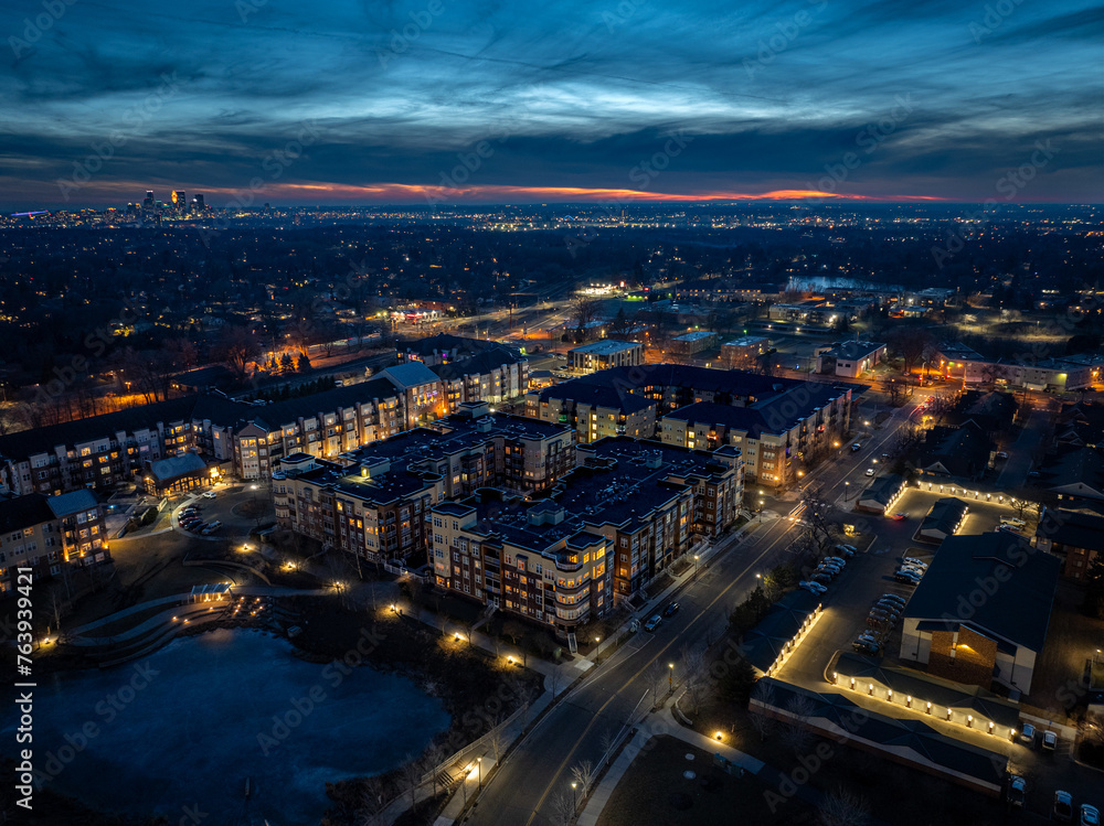 Evening aerial view of Saint Anthony Village with Downtown Minneapolis in the background