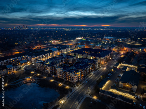 Evening aerial view of Saint Anthony Village with Downtown Minneapolis in the background