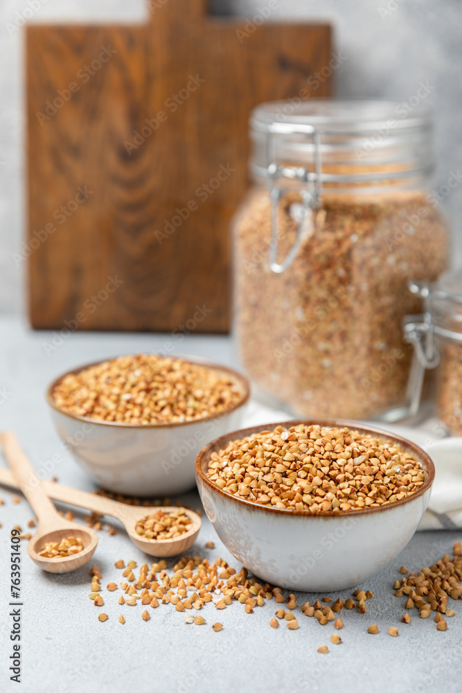 Green buckwheatin on a wooden kitchen table.Superfood.Raw buckwheat porridge.Healthy vegan food concept, eco products, diet. Copy space.Organic food.weight loss and proper nutrition. Green buckwheatin on a wooden kitchen table.Superfood.Raw buckwheat porridge.Healthy vegan food concept, eco products, diet. Copy space.Organic food.weight loss and proper nutrition.