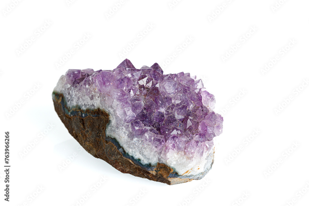 Amethyst mineral stone macro on white background Amethyst mineral stone macro on white background
