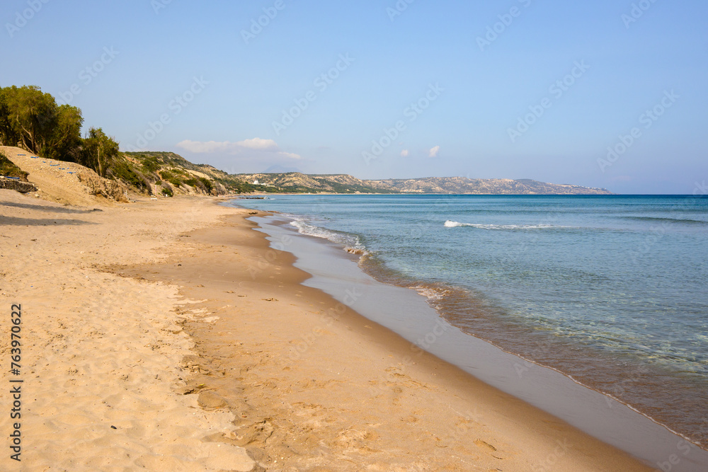 Paradise Beach with golden fine sand, clean shallow water. The most famous beach on the island of Kos. Greece