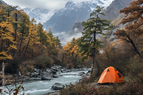 Camping on the mountain river in the autumn forest, Nepal