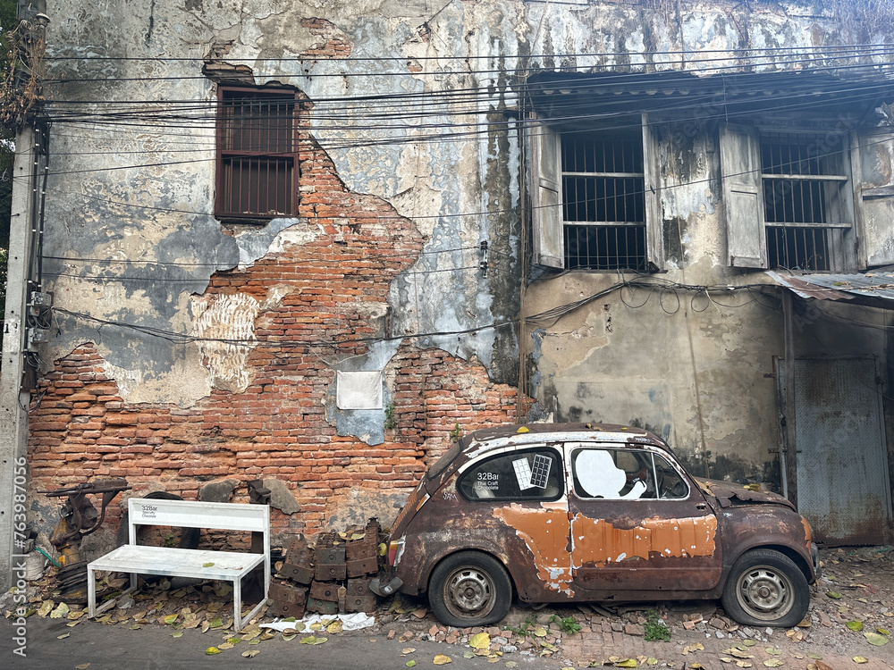 old abandoned car on street