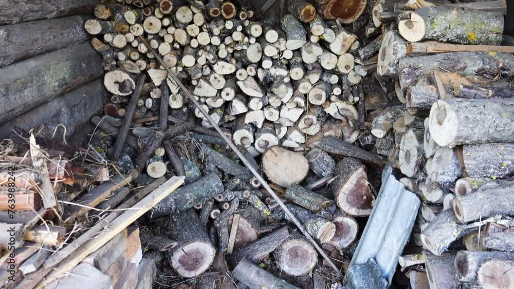 A small shed with wood for heating the stove. A small shed with wood for heating the stove.