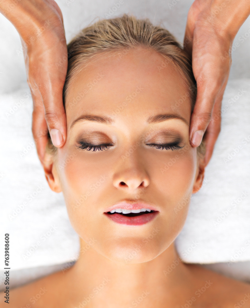 Resort, closeup or woman in head, massage or mental health as self care, relax or luxury wellness. Retreat, girl or hand in spa, therapy or zen of clinic, sleeping or peace on cosmetology table